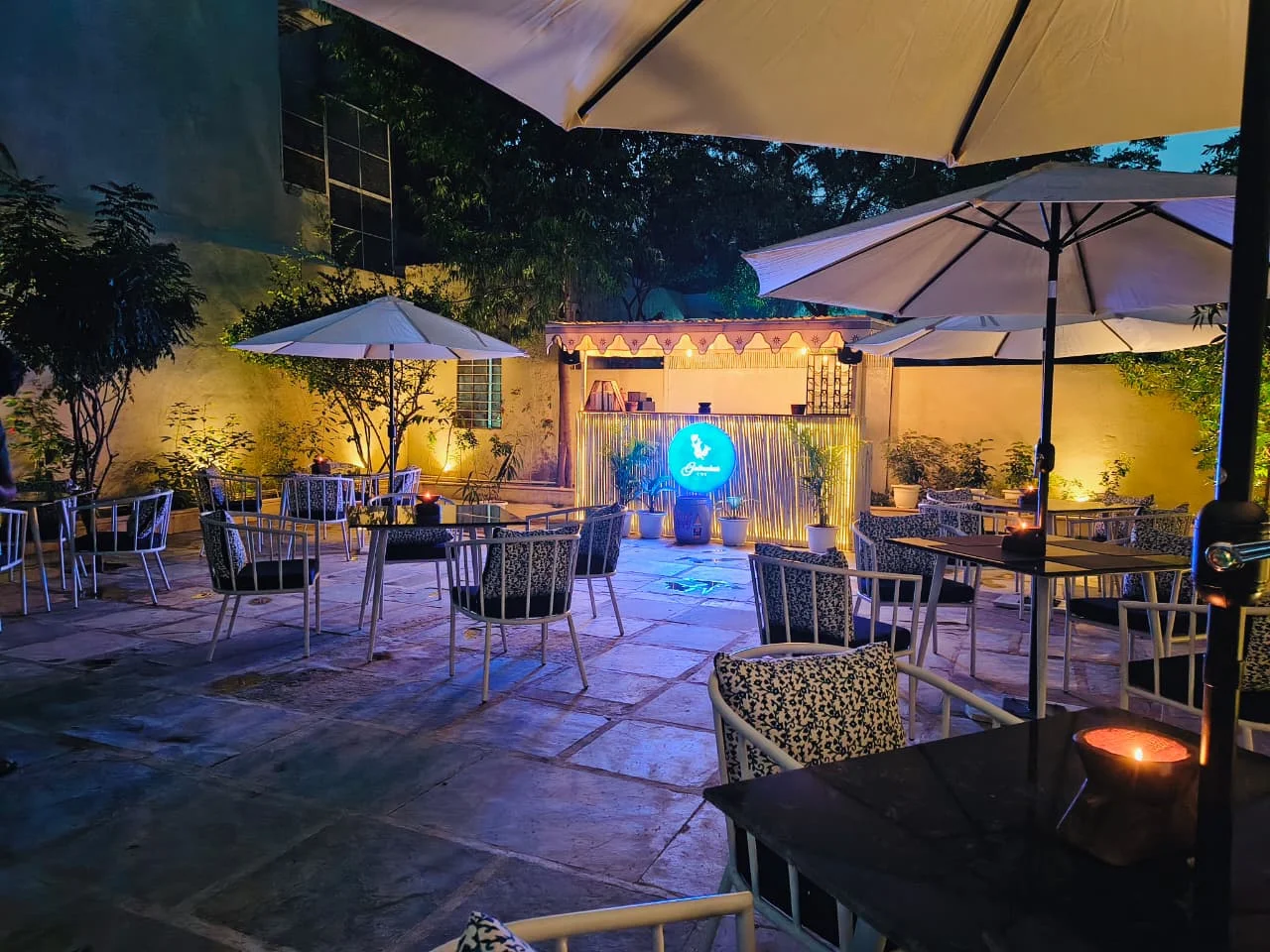 Gulmohar Café courtyard of the heritage haveli lit up at night